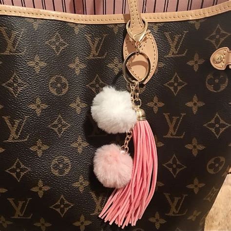 louis vuitton pom pom keychain|Louis Vuitton card holder.